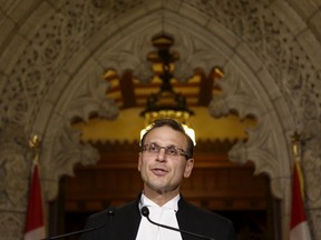 Senate Speaker Leo Housakos speaks at a news conference about the auditor general's report on Senate expenses outside the Senate Chamber on Parliament Hill in Ottawa June 9, 2015. REUTERS/Patrick Doyle