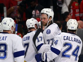 Victor Hedman of the Tampa Bay Lightning celebrates with teammates after defeating the Chicago Blackhawks in Game 3 of the Stanley Cup Final at the United Center on June 8, 2015. (Bruce Bennett/Getty Images/AFP)