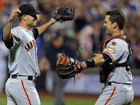 San Francisco Giants starting pitcher Chris Heston (left) celebrates with catcher Buster Posey after throwing a no-hitter against the New York Mets at Citi Field Tuesday. (Adam Hunger/USA TODAY Sports)