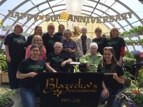 Staff from the past and present gather together for a group photo during recent 50th anniversary celebrations at Blazecka’s Greenhouses.