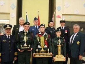 Members of the Army Cadet 3013 Cochrane Commando display their awards for their work during the 2014-2015 season. Back row (left to right): Dianna Van Geutselaar, L. Col. Macmillan, Cpt. Patricia Nelson. Front row: Fire Chief Richard Vallee, Cpt Jacob Bernier, WO Taylor Martin, L. Cpl Mackenzie Foy and John Van Geutselaar.