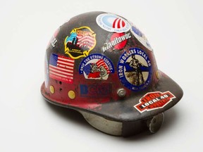 Ironworker construction helmet belonging to Larry Keating is seen in this photograph before becoming a part of the National September 11 Memorial & Museum in New York August 22, 2011. Larry Keating was an ironworker foreman who helped oversee the removal of wreckage from the World Trade Center site during the nine-month clean-up operation following the attack, and was chosen by the ironworkers union, Local 40, to represent his colleagues at the ceremonial removing of what became known as Last Column - an upright piece of of the towers that had become covered in mementos from the clean-up workers and from which flew an American flag. He wore his hardhat throughout the clean-up, and continued to wear it proudly for site visits until his death in 2011 from a heart attack. The museum, which occupies seven stories below the ground of the World Trade Center site--is still being built at the site of the fallen towers. It is due only to open in 2012, on the 11th anniversary of the attacks. 

(REUTERS)
