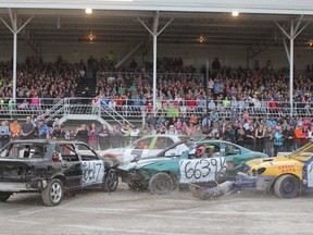 The demolition derby always brings a big crowd to the Clinton Spring Fair. Round one was only the start of the much-anticipated event. Firefighters were standing by at all times to help should anything go wrong. (Laura Broadley Clinton News Record)