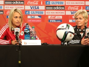 Team Germany head coach Silvia Neid (right) and midfielder Lena Goessling speak at a press conference on at Lansdowne Stadium on Wednesday, June 10, 2015 ahead of the country's 2015 FIFA Women's World Cup match Thursday against Norway. (Chris Hofley/Ottawa Sun)