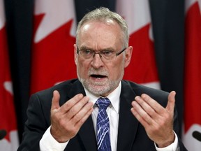 Auditor General Michael Ferguson speaks at a news conference about the auditor general's report on Senate expenses at the National Press Theatre in Ottawa June 9, 2015. REUTERS/Patrick Doyle