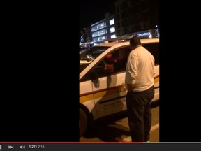 An Ottawa cabbie delivers a profanity-laden tirade, telling a bylaw officer to "go fight Uber". YOUTUBE SCREENGRAB