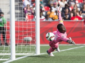 Ivory Coast goalkeeper Dominique Thiamale fails to stop Alexandra Popp’s free-kick during Germany’s 10-0 win during the Women’s World Cup at Landsdowne Stadium in Ottawa on June 7, 2015. (AFP PHOTO/NICHOLAS KAMM)