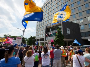 CUPE rally in front of city hall in London. (MIKE HENSEN, The London Free Press)