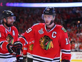 Chicago Blackhawks centre Jonathan Toews (19) celebrates with winger Patrick Sharp (10) after scoring against the Tampa Bay Lightning in Game 4 of the Stanley Cup final Wednesday at United Center in Chicago. (Dennis Wierzbicki/USA TODAY Sports)