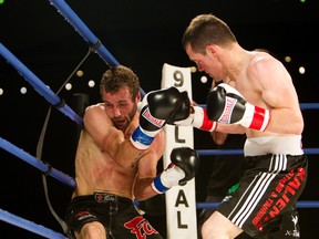 Cam O'Connell, shown here in a fight in 2013, has been training with internationally ranked Red Deer boxer Arash Usmanee, who will be in O'Connell's corner at Friday's fight. (Edmonton Sun file)