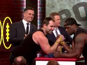 Former Australian rugby players Wendell Sailor and Ben Ross square off in an arm wrestling match for charity.
