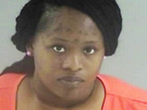 Laquanda Newby, accused of leaving a child in a hot car, turned herself in to police while her kids waited in a hot car. (Henrico County Jail)