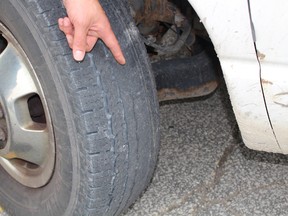 Damage to a tire could cause a blow-out. The commercial vehicle was carrying two 450 L propane tanks when it was stopped during a safety campaign in Bradford, Ont. on Wednesday June 10, 2015. Miriam King/Bradford Times/Postmedia Network