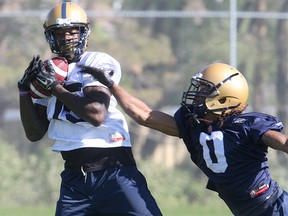 Toney Clemons (left) had three catches for 46 yards in the Bombers exhibition win over the Toronto Argos on Tuesday.