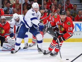 Lightning centre Steven Stamkos (91) battles Blackhawks centre Jonathan Toews (19) for the puck during Game 4 of the Stanley Cup final in Chicago on Wednesday, June 10, 2015. (Bruce Bennett/Pool Photo via USA TODAY Sports)
