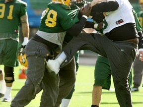Wednesday Oct. 13, 2010: A fight broke out at the Edmonton Eskimos practice which saw Patrick Kabongo kick teammate Walter Curry twice, once hitting him in the groin area. It took numerous players and the had coach to help break-up the on-field fight. TOM BRAID/EDMONTON SUN QMI AGENCY