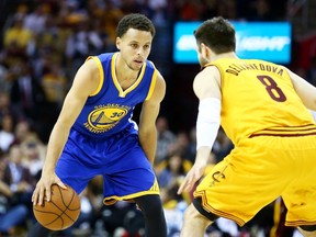 Golden State's Stephen Curry dribbles during Thursday night's game in Clevleand. (AFP)