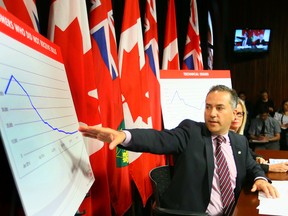 Hydro One President and CEO Carm Marcello responds to the Ontario Ombudsman's report on Hydro One at Queens Park in Toronto, Ont. on Monday May 25, 2015. Dave Abel/Postmedia Network