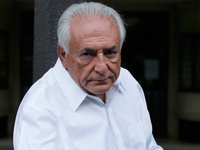 Former IMF head Dominique Strauss-Kahn enters his car as he leaves his apartment in Paris, France, June 12, 2015 before he travelled to Lille to learn the verdict in the trial called the Carlton Affair where 14 people including Strauss-Kahn stood accused of sex offences including the alleged procuring of prostitutes. REUTERS/Gonzalo Fuentes