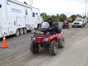 Greater Sudbury Police officers are using all-terrain vehicles in their search for Gaetanne (Gail) Lynds in the Wanup area on Friday. Gaetanne's husband, Boyd Lynds, was found dead Wednesday afternoon. The couple was reported missing on Tuesday morning. John Lappa/Sudbury Star/Postmedia Network