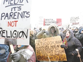 People protest Ontario?s revised sex-education curriculum in front of the Ontario legislature at Queen?s Park in February.(Postmedia file photo)