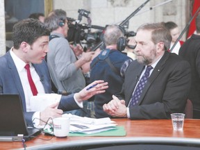 Former CBC personality Evan Solomon interviews NDP Leader Thomas Mulcair on budget day on Parliament Hill in Ottawa in March 2013. The CBC fired Solomon this week over allegations of commissions from art sales to big-name guests on his show in violation of company policy. Columnist Shauna Rae thinks Solomon?s alleged behaviour is nothing new and said public adoration is what creates the opportunity for abuse of celebrity status. (Reuters file photo)