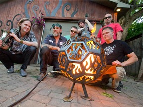AudioForge, from left, Tom Heyda, Scott McKay, Adam Dafoe, Jeremy Hobbs, Chris Newton and Jeff Werkmeister will perform their unique blend of music and metal work at Nuit Blanche Saturday on Dundas St.  (CRAIG GLOVER, The London Free Press)