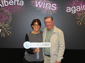 Carole and Thomas Bruce Rowe, winners of one of 38 Max Millions prizes in the May 22, 2015 Lotto Max draw. Rowe is the former MLA for Olds-Didsbury-Three Hills, and one of nine Wildrose Party MLAs to take part in December 2014's defection to the Alberta Progressive Conservatives. Photo courtesy Western Canada Lottery Corporation.