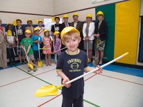 Grade one student Dovin Carroll along with other students and dignitaries attended a "construction kick-off" ceremony at Bishop Townsend Public School in London, Ont. on Wednesday June 10, 2015.  (DEREK RUTTAN, The London Free Press)