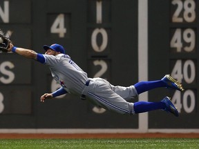 Kevin Pillar of the Toronto Blue Jays lays out to catch a ball hit by Brock Holt of the Boston Red Sox during the sixth inning at Fenway Park on June 12, 2015 in Boston. (Jim Rogash/Getty Images/AFP)