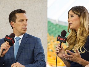 TSN’s James Duthie (left) and Kara Lang broadcast from their booth before a FIFA Women’s World Cup 2015 match between China and the Netherlands at Commonwealth Stadium in Edmonton, Alta., on Thursday June 11, 2015. (Ian Kucerak/Edmonton Sun/Postmedia Network)