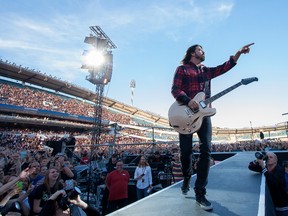 Foo Fighters frontman Dave Grohl injures his leg while performing in Gothenburg. Grohl was rushed to a hospital but returned less than an hour later to finish the show while sitting in a wheelchair, with his leg in a cast. (WENN.COM)