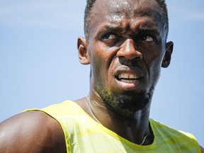 Usain Bolt of Jamaica reacts after winning the 200m at the IAAF Diamond League Grand Prix track and field competition in New York June 13, 2015. (REUTERS/Eduardo Munoz)