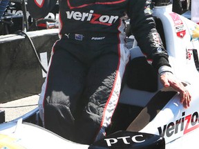 Will Power is pumped after winning the pole position for Sunday's Honda Indy Toronto. (Veronica Henri/Toronto Sun)