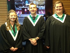 Lambton College graduates and award recipients Alyssa Kraayenbrink, left, Ben Borsa, and Tiffany Magdic, pose before receiving their diplomas Saturday.There were 1,895 graduating students in this year's class: a record size for the school. (Handout/Sarnia Observer/Postmedia Network)