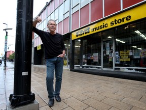 Peter Androchow, general manager of Steve's Music on Rideau Street, poses for a photo outside his store in Ottawa Friday June 12, 2015. Peter has been concerned for the downtown retail due to the construction over the past few years.  
Tony Caldwell/Ottawa Sun