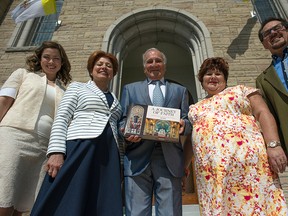Clergy members and council members Nadia Lappa, Carla Lappa, Italo Tiezzi, Trina Costantini Powell and Giuseppe Pasian at the unveiling of the new history book of St. Anthony's called A Journey of Faith — A History of St. Anthony of Padua Church.
DANI-ELLE DUBE/Ottawa Sun