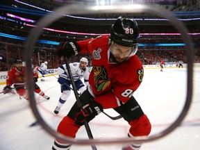 Antoine Vermette of the Chicago Blackhawks handles the puck in the first period against the Tampa Bay Lightning during Game 4 of the Stanley Cup Final at the United Center on June 10, 2015. (Bruce Bennett/Getty Images/AFP)