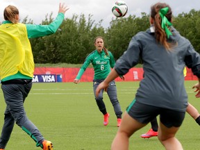 Servet Uzunlar (centre) takes part in a Team Australia FIFA Women's World Cup Canada 2015 practice at the Edmonton Soccer Complex, in Edmonton Alta. on Sunday June 14, 2015. David Bloom/Edmonton Sun/Postmedia Network