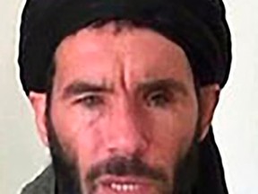 Algerian militant Mokhtar Belmokhtar is seen in an undated picture from the U.S. Department of Justice.  The U.S. military confirmed on Sunday that Belmokhtar was the target of a U.S. air strike in Libya but did not say if he had been killed.  Libya's recognized government said earlier on Sunday that Belmokhtar, blamed for masterminding an Algerian gas field attack and running smuggling routes across North Africa, had been killed in a U.S. air strike inside Libya.  REUTERS/US Department of Justice/Handout