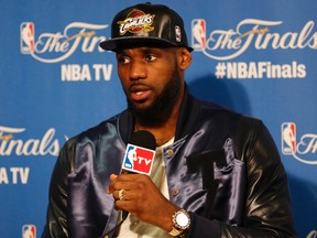 Cleveland Cavaliers forward LeBron James speaks to media following the 104-91 loss against the Golden State Warriors in Game 5 of the NBA Finals. at Oracle Arena on June 14, 2015. (Kelley L Cox/USA TODAY Sports)