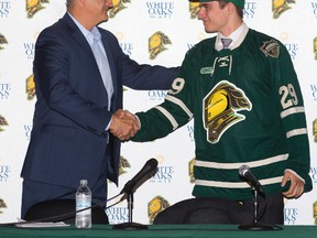 London Knights general manager Basil McRae welcomes Sam Miletic to the team at a press conference in London, Ont. on Monday June 15, 2015. (DEREK RUTTAN, The London Free Press)