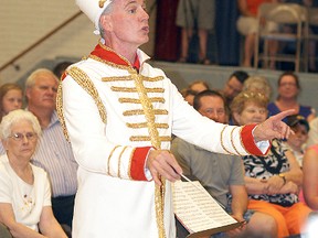 Wallaceburg District Secondary School music teacher Dave Babbitt performs at his musical celebration held at the school on June 10. He is dressed as a character from his favourite musical—The Music Man. Babbitt is retiring from WDSS after 31 years.