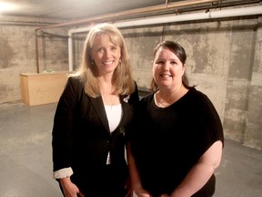 Joan Gowsell, left, and Sherry Lemery, co-presidents of Breast Cancer Action Kingston, stand in the former bomb shelter in their building in Kingston, which they plan to turn into an exercise studio for women recovering from breast cancer. (Michael Lea/The Whig-Standard)