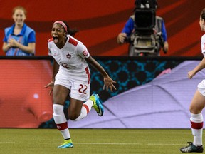 Ashley Lawrence, left, of Canada celebrates her goal in the first half during the 2015 FIFA Women's World Cup Group A match against the Netherlands at Olympic Stadium on June 15, 2015 in Montreal, Quebec. (Minas Panagiotakis/Getty Images/AFP)