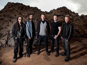 Chatham native James Miller, centre, plays guitar in the metal band Chagall. The group has been invited to perform at Toronto's North by Northeast Music festival June 17. The other members of the group are Adam Blake (left), Arnold Alaadhami (second from left), Dan Clements (second from right) and Luke Gallo (far right). (Submitted photo)