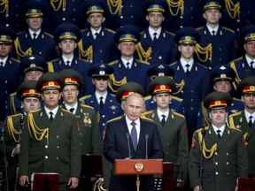 Russian President Vladimir Putin delivers a speech at the opening of the Army-2015 international military forum in Kubinka, outside Moscow, Russia, on June 16, 2015. Putin said on Tuesday Russia would add more than 40 new intercontinental ballistic missiles to its nuclear arsenal this year and a defence official accused NATO of provoking a new arms race. (REUTERS/Maxim Shemetov)