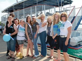 Miss Teen Sarnia Alysha Bellyk stands with representatives and volunteers from Cat Chance prior to the launch of the Cat Chance Cruise, a fundraiser aimed towards raising money and awareness for rescuing feral cats in Sarnia. 
CARL HNATYSHYN/SARNIA THIS WEEK