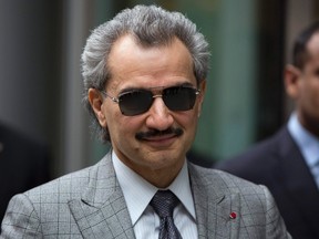 Prince Alwaleed bin Talal is seen leaving the High Court in London in this July 2, 2013 file photograph. (REUTERS/Neil Hall/Files)