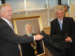 ERNST KUGLIN/THE INTELLIGENCER
Eben James Jr. presented former Quinte West mayor John Williams with an oil painting during Monday’s city council meeting. James said the tribute was to recognize the teamwork used in moving the city forward, but singled Williams out for his strong leadership.